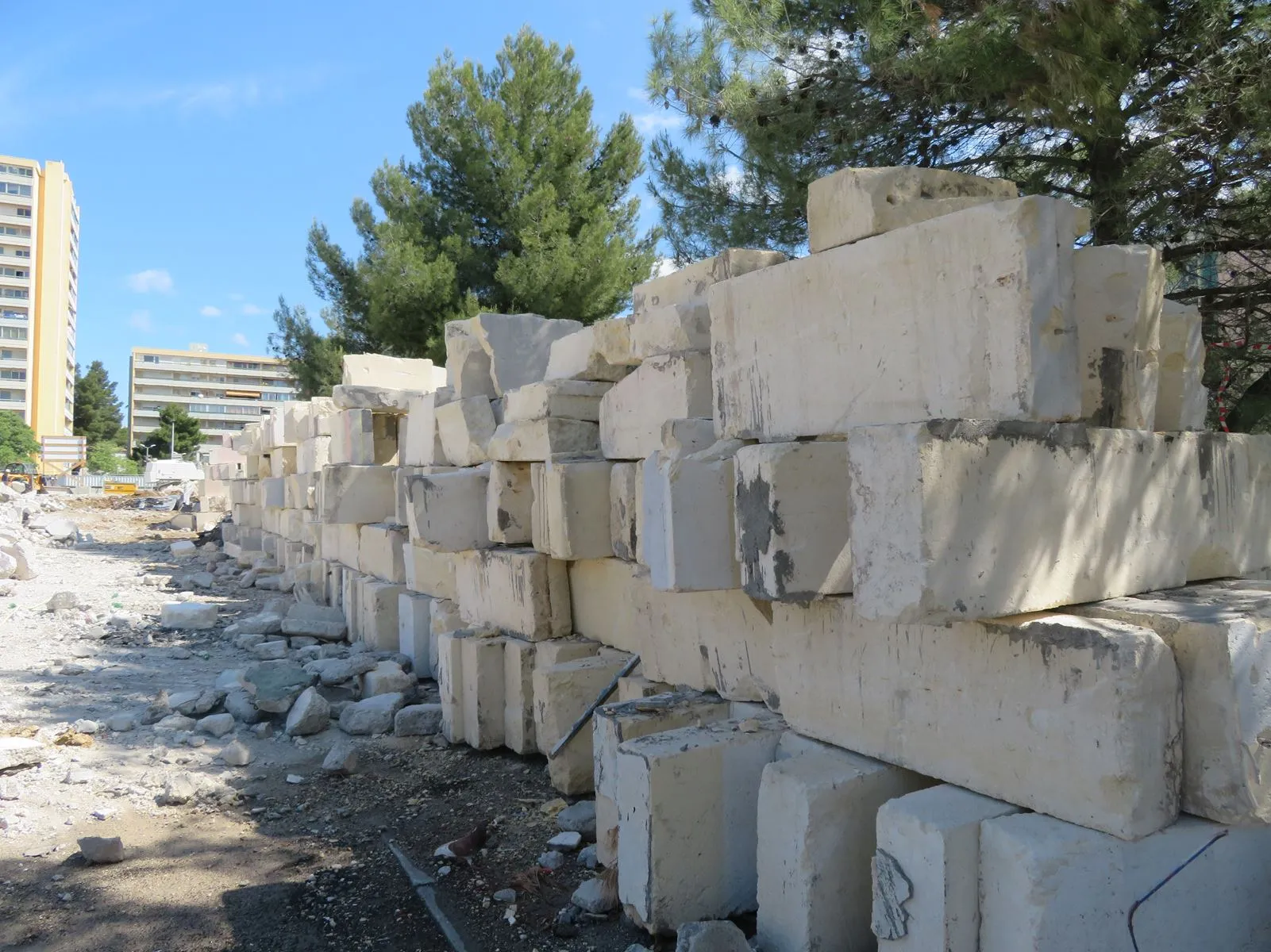 Dépose préservante de pierres naturelles de Castries de la résidence URANUS | Montpellier (34) - Logo